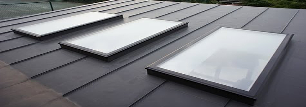 3 vented flat glass skylights